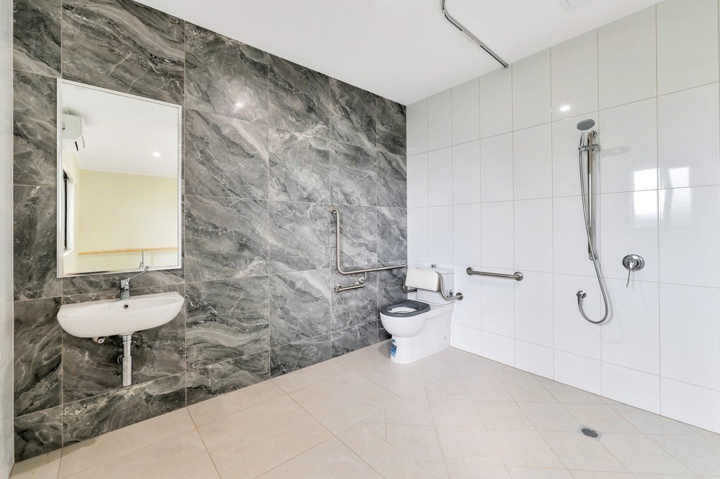 An accessible bathroom with a step-free shower.