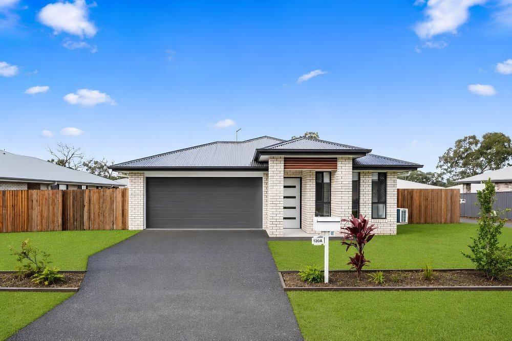 The front of 120A Bideford Street: a single-storey home with a garage and front lawn.