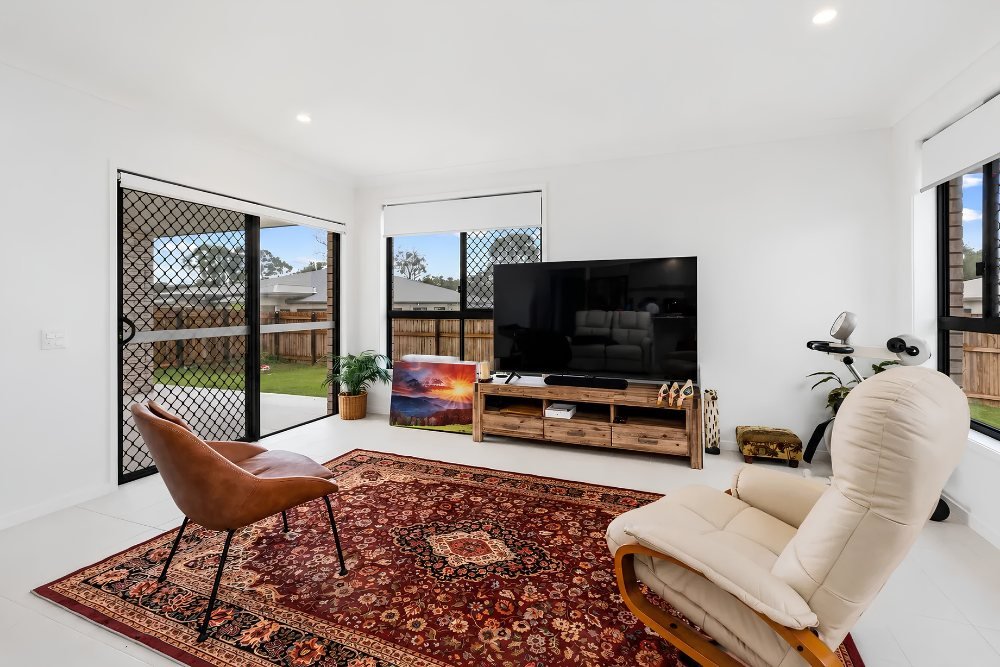 The family and living area, with a sliding door to the alfresco.