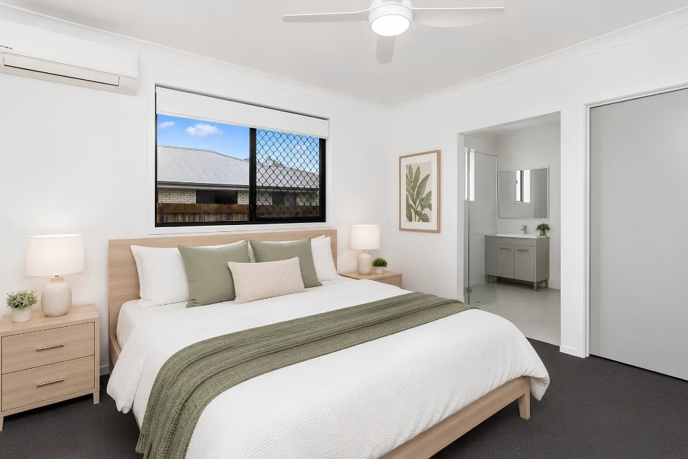 The main bedroom, with an ensuite and walk-in robe.