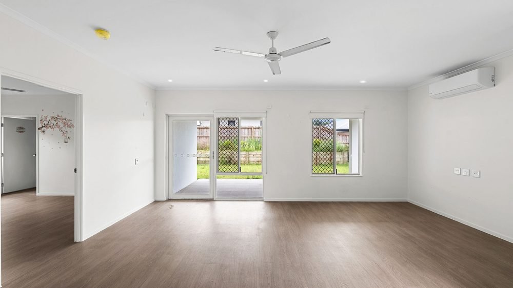 The living area, with sliding doors out to the backyard.